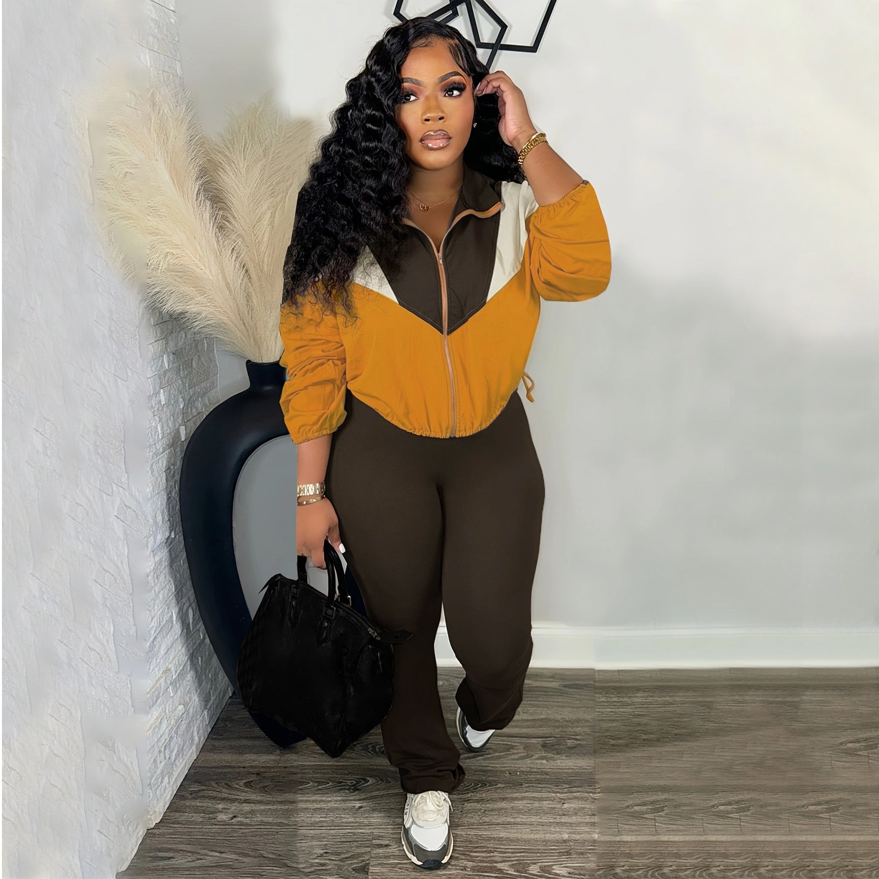 Women color matching zipper top and pant sports two piece set