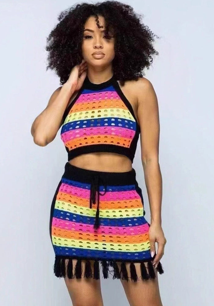 Women multi-color striped hollowed-out knitting halter neck top with tassel bodycon skirt, two-piece set.