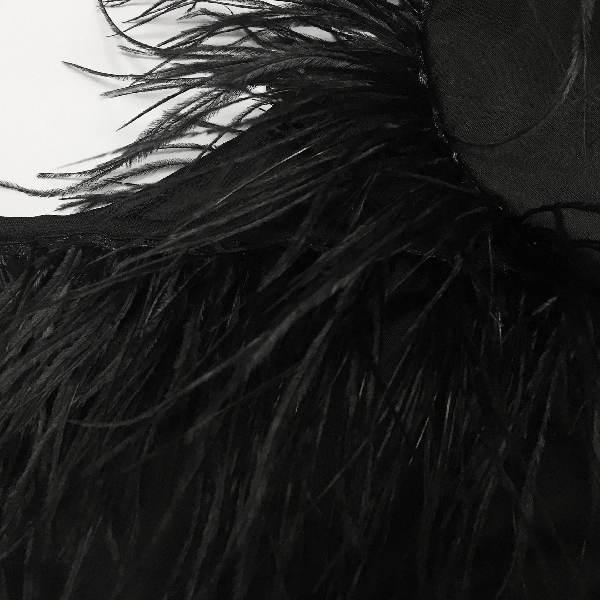 Solid color V-neck sleeveless feather irregular skirt dress 23