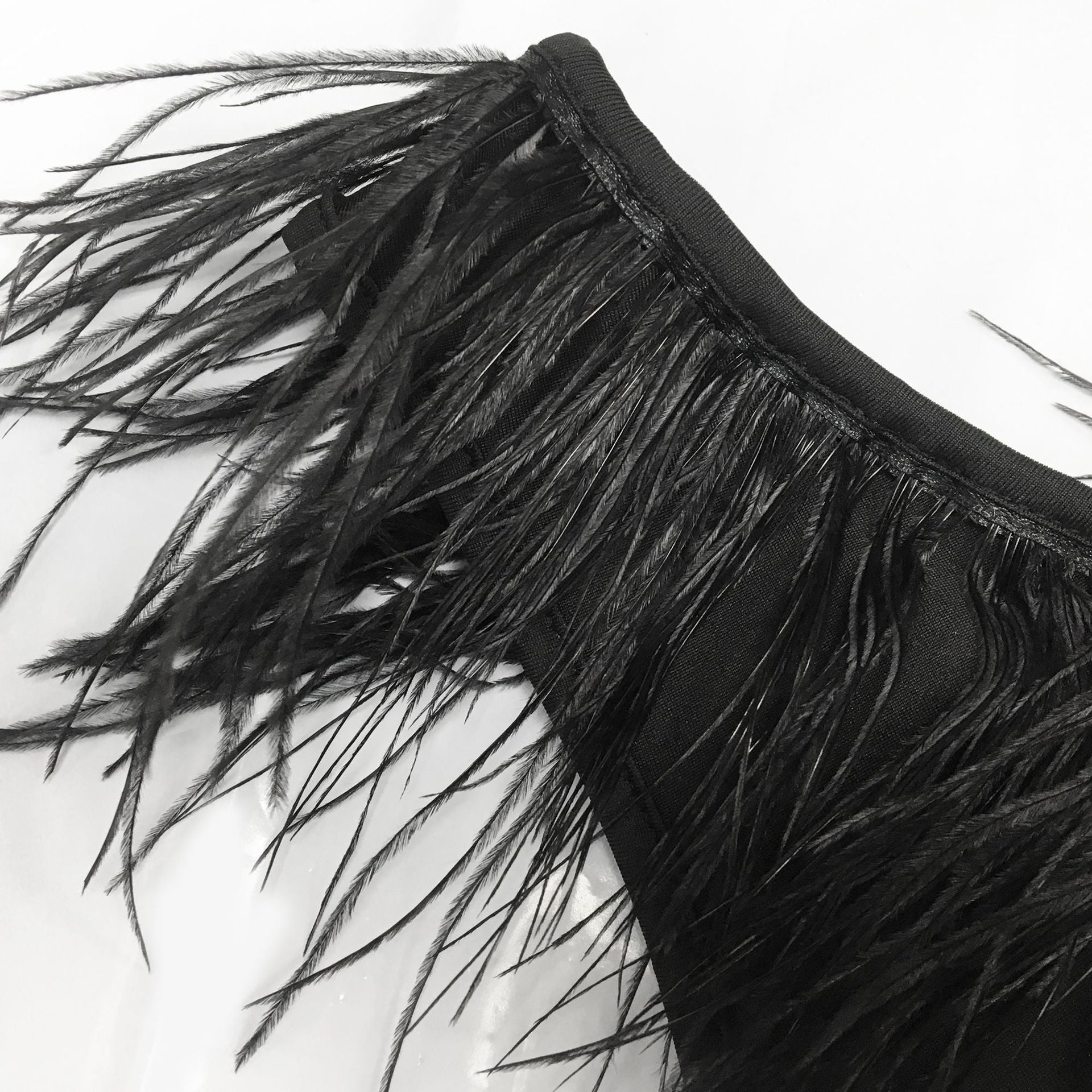 Solid color V-neck sleeveless feather irregular skirt dress 22