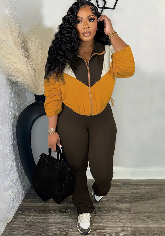 Women color matching zipper top and pant sports two piece set